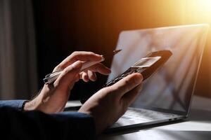 businessman working on desk office with using a calculator to calculate the numbers, finance accounting concept photo