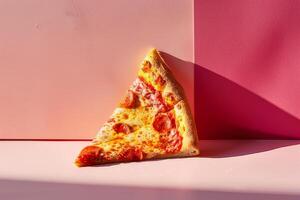 Pepperoni pizza on a pink background. Minimal concept photo