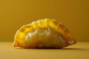 Japanese gyoza dumplings on a yellow background. Minimalism. photo