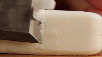 ASMR cutting white soap with a chisel. video