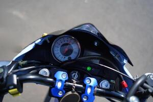 close up of speedometer, 4-Stroke underbone motorcycle photo