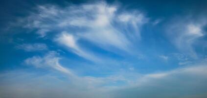 Blue sky with whie Cirrus clouds photo