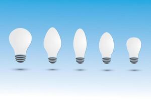 A set of white light bulbs with different size and shape on blue background vector