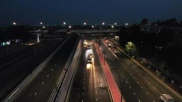 A drone over a night highway in the city center. Cloudless Summer Night video