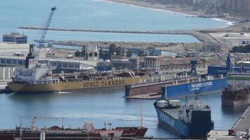 Malaga, Spain, 2017 - Merchant ship docking at the port dock video