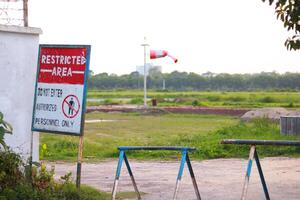 Restricted area sign in a private area photo