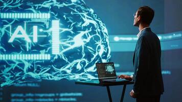 System administrator uses neural networks modeled after human brain to solve complex problems. AI researcher in futuristic workspace using artificial intelligence to look at data, camera A video