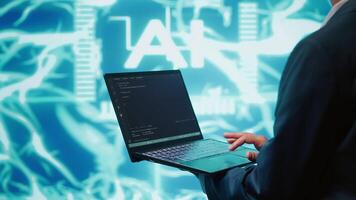 System administrator solving tasks on laptop, running artificial intelligence programming scripts. Close up shot of technician manipulating lines of code for AI applications development, camera A video