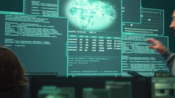 Cyber investigation team working in a governmental hacking room, working on computer security and phishing detection. Emphasizing online security, digital threats and malware prevention. Camera A. video
