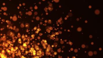 animação do abstrato enluvar brilhar partículas. voar do brilhante docs e partículas em a laranja fundo. video