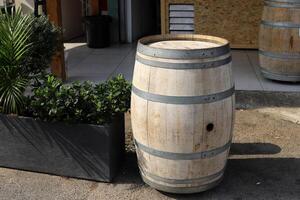 Large barrel for transporting liquids. photo