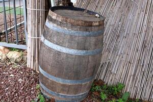 Large barrel for transporting liquids. photo