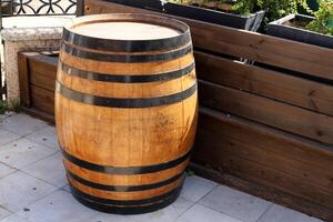 Large barrel for transporting liquids. photo