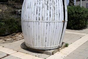 Large barrel for transporting liquids. photo