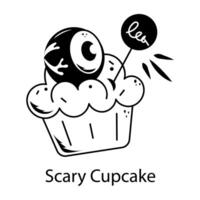 A scary cupcake with an eyeball, doodle style icon vector