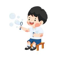 Kid student sitting blowing soap bubbles vector