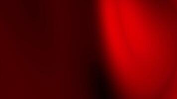 Dark red background blurred, with a light red area. Suitable for Valentine's Day designs, romantic themes, abstract backgrounds, and banners video