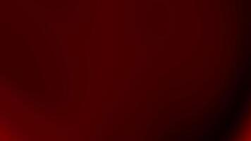 Dark red background with a bright red light. Suitable for abstract backgrounds, holiday themes, contrast concepts, and dynamic visual designs video