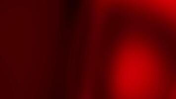 Dark red background gradient with a blurry dark spot creates abstract and mysterious designs suitable for backgrounds, textures, or graphic elements video