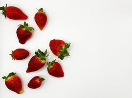 Juicy delicious strawberries in a plate. Lots of strawberries. Strawberries in a container. Red strawberries. photo
