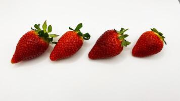 Juicy delicious strawberries in a plate. Lots of strawberries. Strawberries in a container. Red strawberries. photo