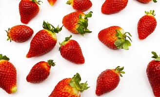 Juicy delicious strawberries in a plate. Lots of strawberries. Strawberries in a container. Red strawberries. photo