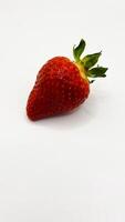 Juicy delicious strawberries in a plate. Lots of strawberries. Strawberries in a container. Red strawberries. photo