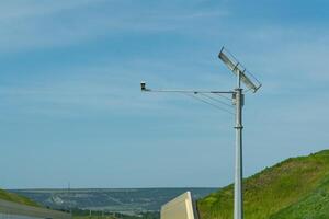 High voltage towers with sky background. Power line support with wires for electricity transmission. High voltage grid tower with wire cable at distribution station. Energy industry, energy saving photo