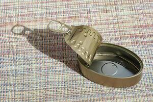 Empty tin can and its shadow. photo