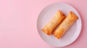 Flat lay fried spring roll crunchy snack homemade on white plat isolated pink photo