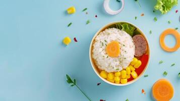 Lunch box rice with carrot, corn, sausage slice for school or work copy space photo