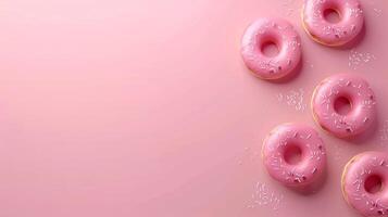 Sweet doughnuts with cream topping baked snack for children copy space isolated pink photo