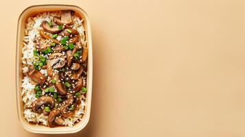 Box lunch rice, oyster sauce, mushroom and sesame copy space flatlay photo