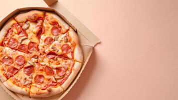 Pizza with beef sausage slice on brown paper box take away copy space photo