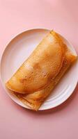 Dosa traditional India food on white plate photo