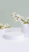Empty podium or pedestal with spring bloom. Spring mock up for cosmetic products photo