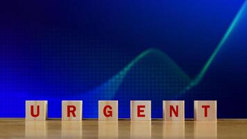 URGENT, Wooden blocks with URGENT text and Business concept, informative and communication background, Urgent Notice Important Quick Serious Speed Concept. photo