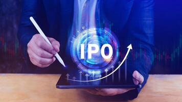 IPO, Initial public offering concept, Businessman with virtual IPO word with stock graph for boosting the growth by IPO process. photo
