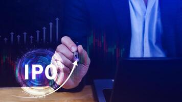 IPO, Initial public offering concept, Businessman with virtual IPO word with stock graph for boosting the growth by IPO process. photo