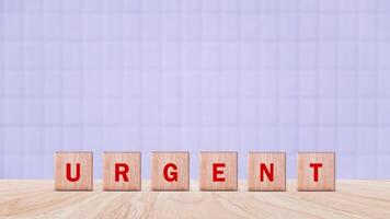 URGENT, Wooden blocks with URGENT text and Business concept, informative and communication background, Urgent Notice Important Quick Serious Speed Concept. photo