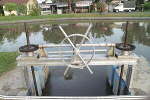 Shutoff valve to control the opening of little water dam photo