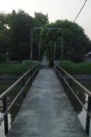 Bridge that separate village to another photo