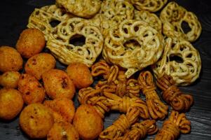 Moring or cimol kering is a typical Garut snack made from wheat flour and tapioca sprinkled with powdered spices. There are spicy, cheesy and original flavors. photo