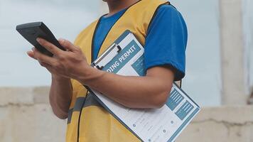 Construction worker, tablet and portrait of man with research and digital data for solar panel installation. Happy, engineer and male contractor with eco and energy project with tech and online plan video