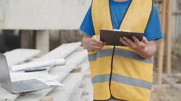 Construction worker, tablet and portrait of man with research and digital data for solar panel installation. Happy, engineer and male contractor with eco and energy project with tech and online plan video