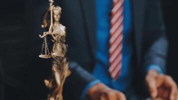 Judge gavel with Justice lawyers having team meeting at law firm background. Concepts of Law and Legal services. video