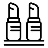 Two lipsticks standing on shelf for makeup routine vector