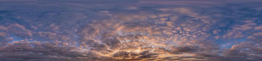 Golden sunset sky panorama Seamless spherical equirectangular 360-degree view with beautiful Stratocumulus clouds, setting sun - for use in 3D graphics as a sky dome or post-processing of drone images photo