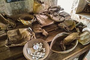 Household items identified from the remains of a particularly powerful volcanic eruption. Household items burned and destroyed due to the 2010 eruption of Mount Merapi photo