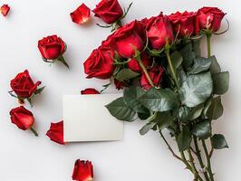 A dozen roses with a blank card photo